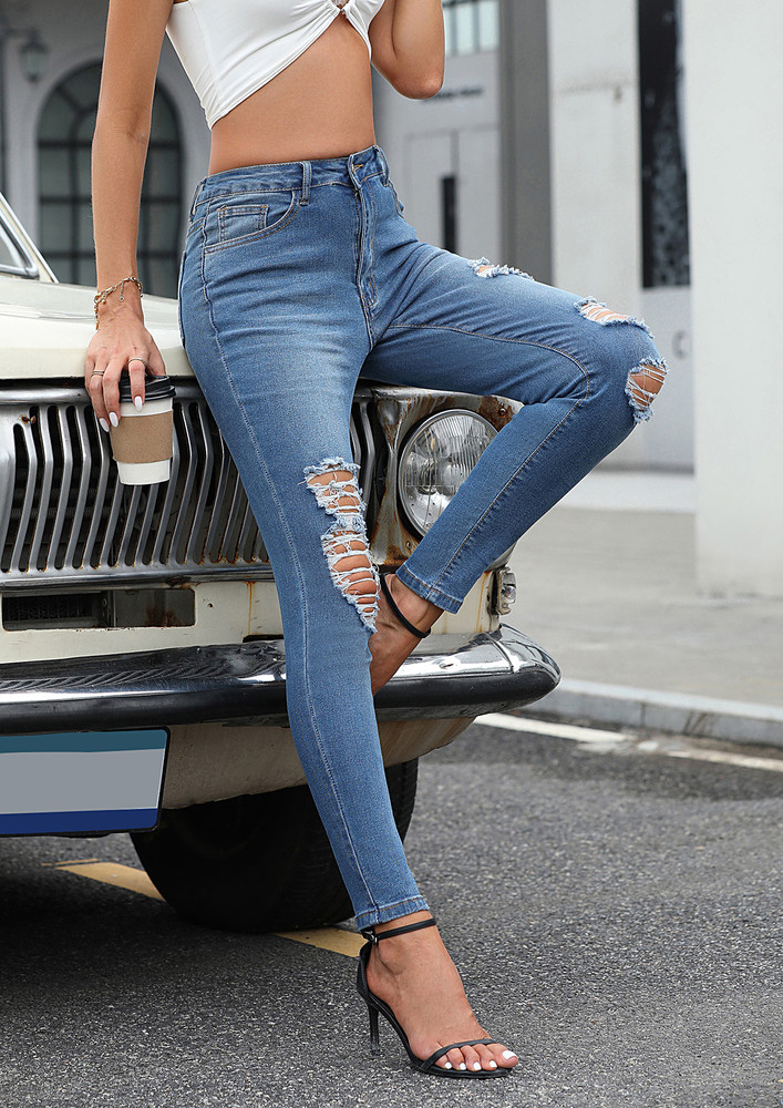 MID-RISE RIPPED SKINNY BLUE JEANS