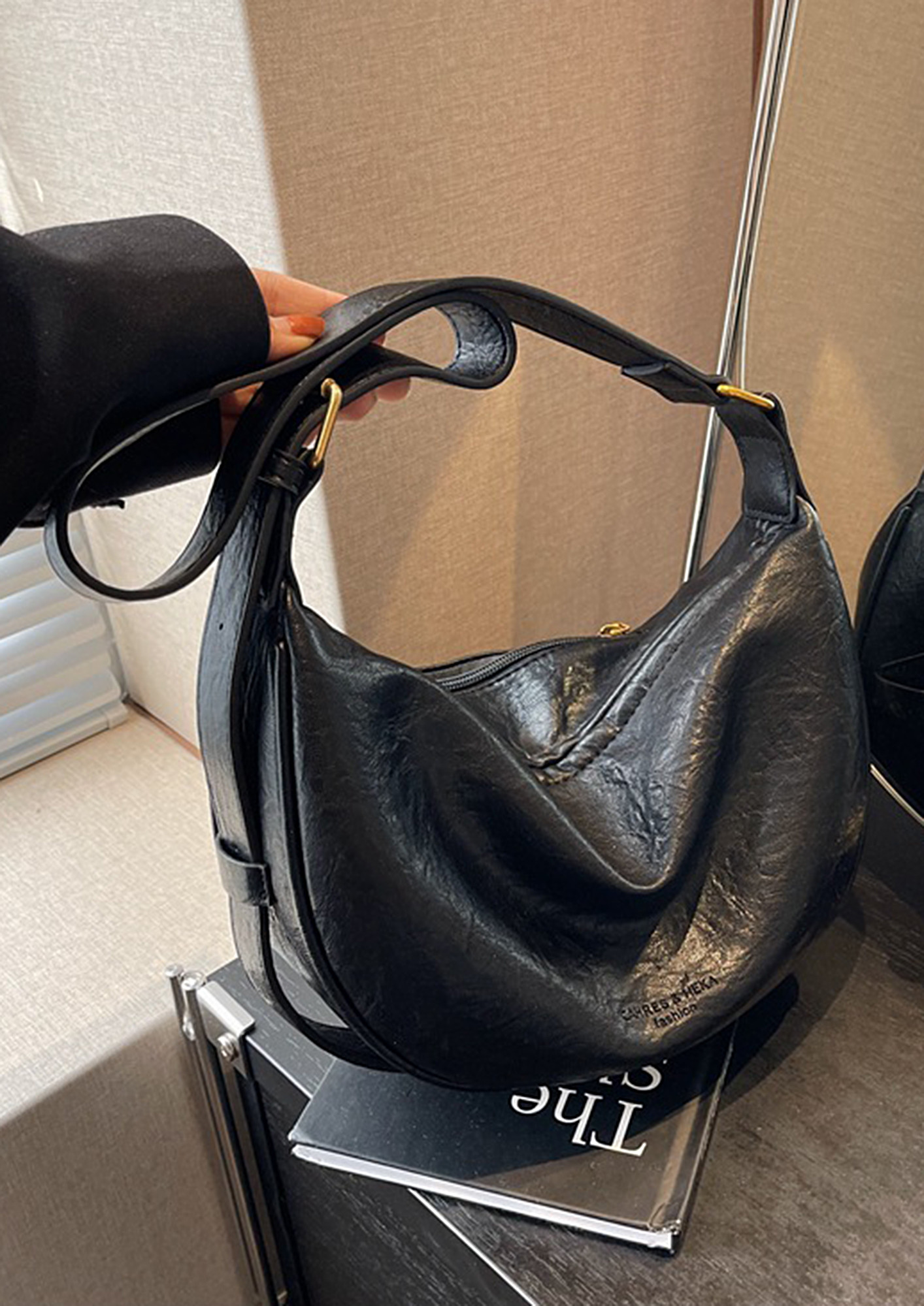 The Row Half Moon Leather Shoulder Bag | Designer Bags | RADPRESENT
