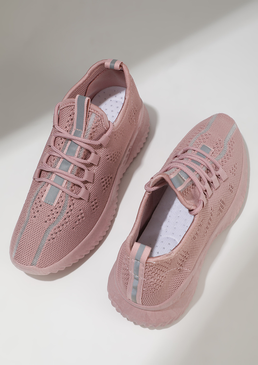 THE SPORTY HIGH-ROLLERS PINK TRAINERS
