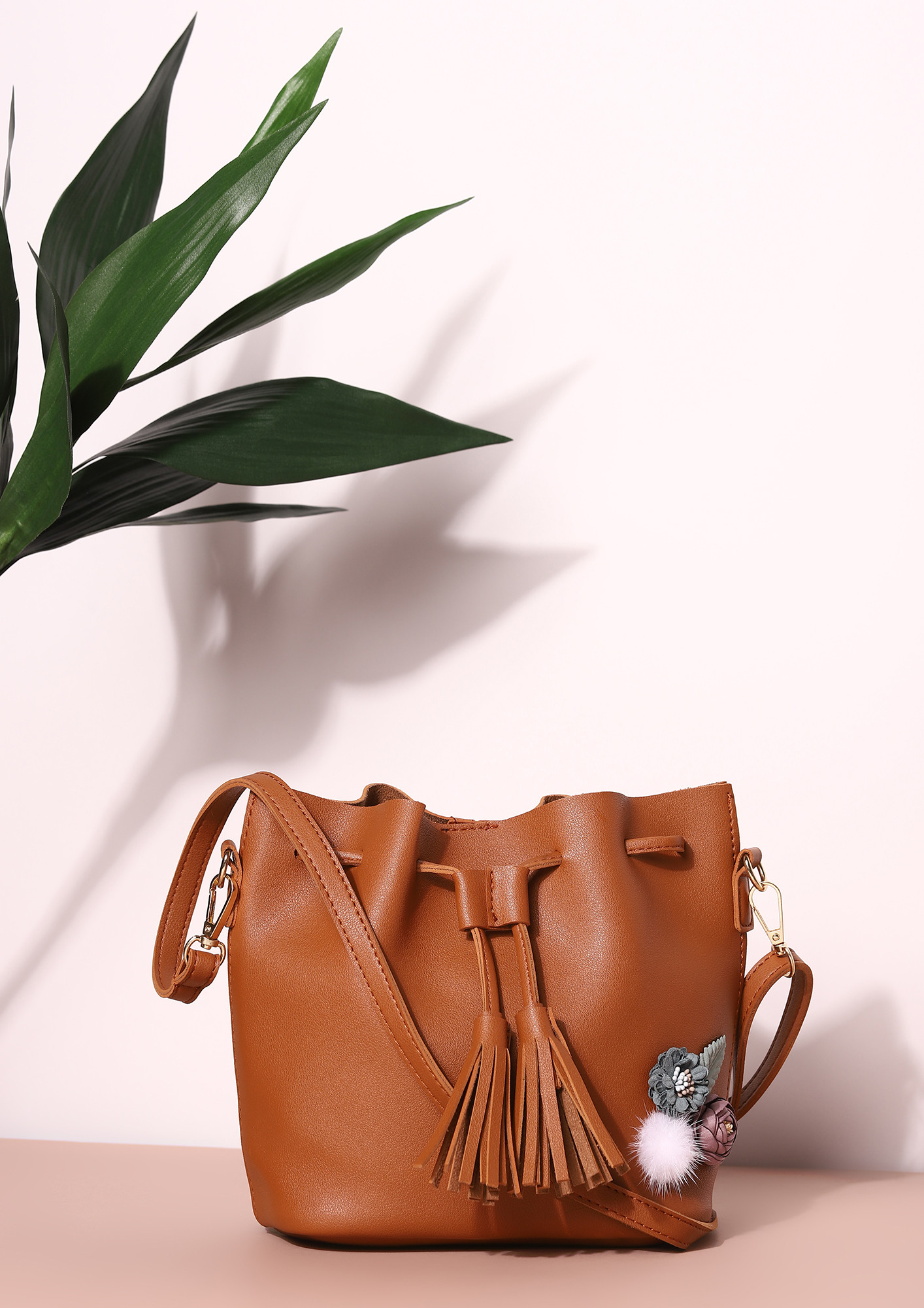 ALL THAT MATTER IN BROWN BUCKET BAG