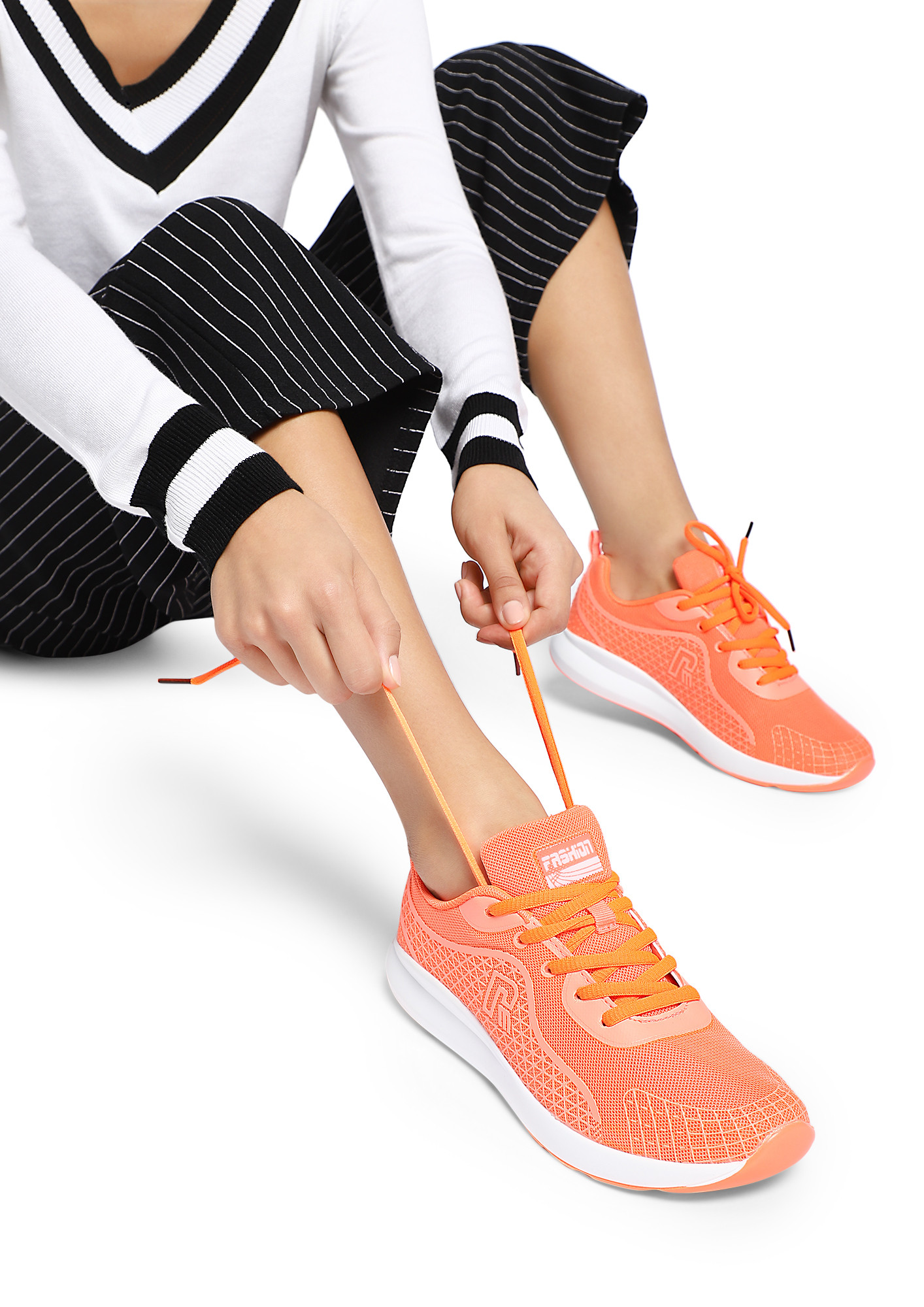 KICK OUT ORANGE TRAINERS