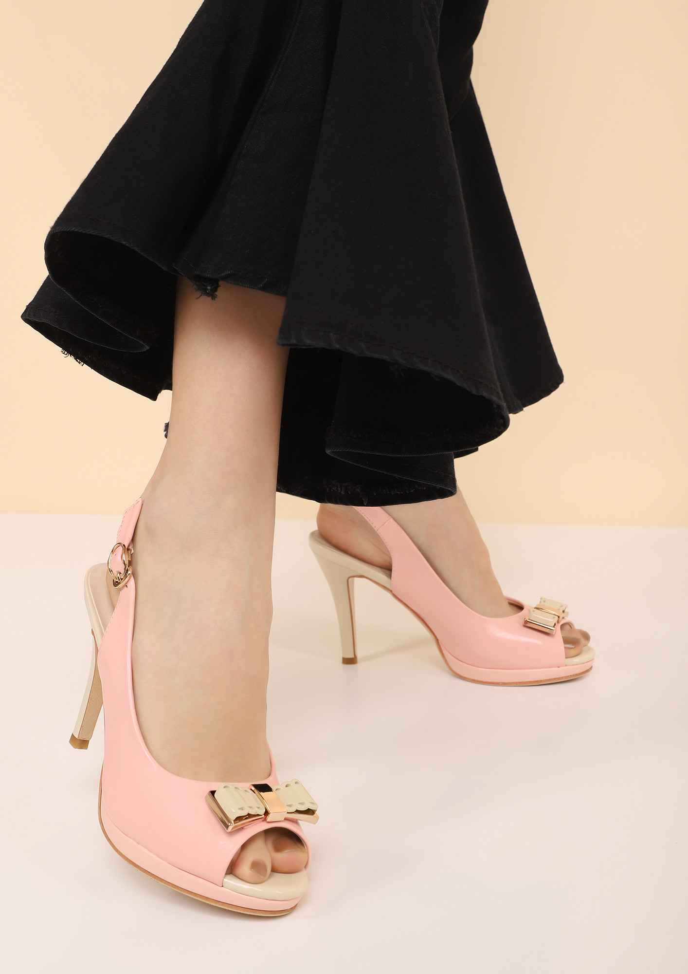 BOWING OUT PINK PEEP-TOE HEELS