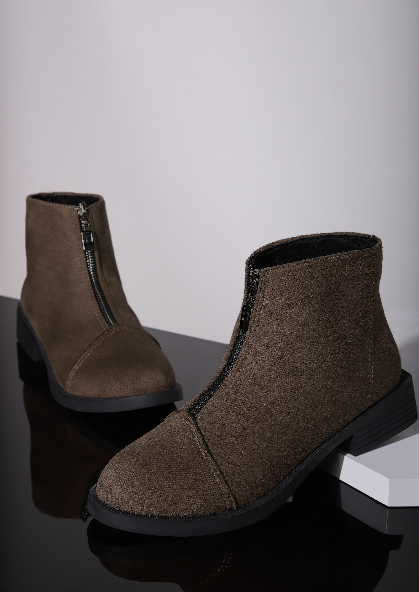SLIP OF THE ZIP BROWN ANKLE BOOTS