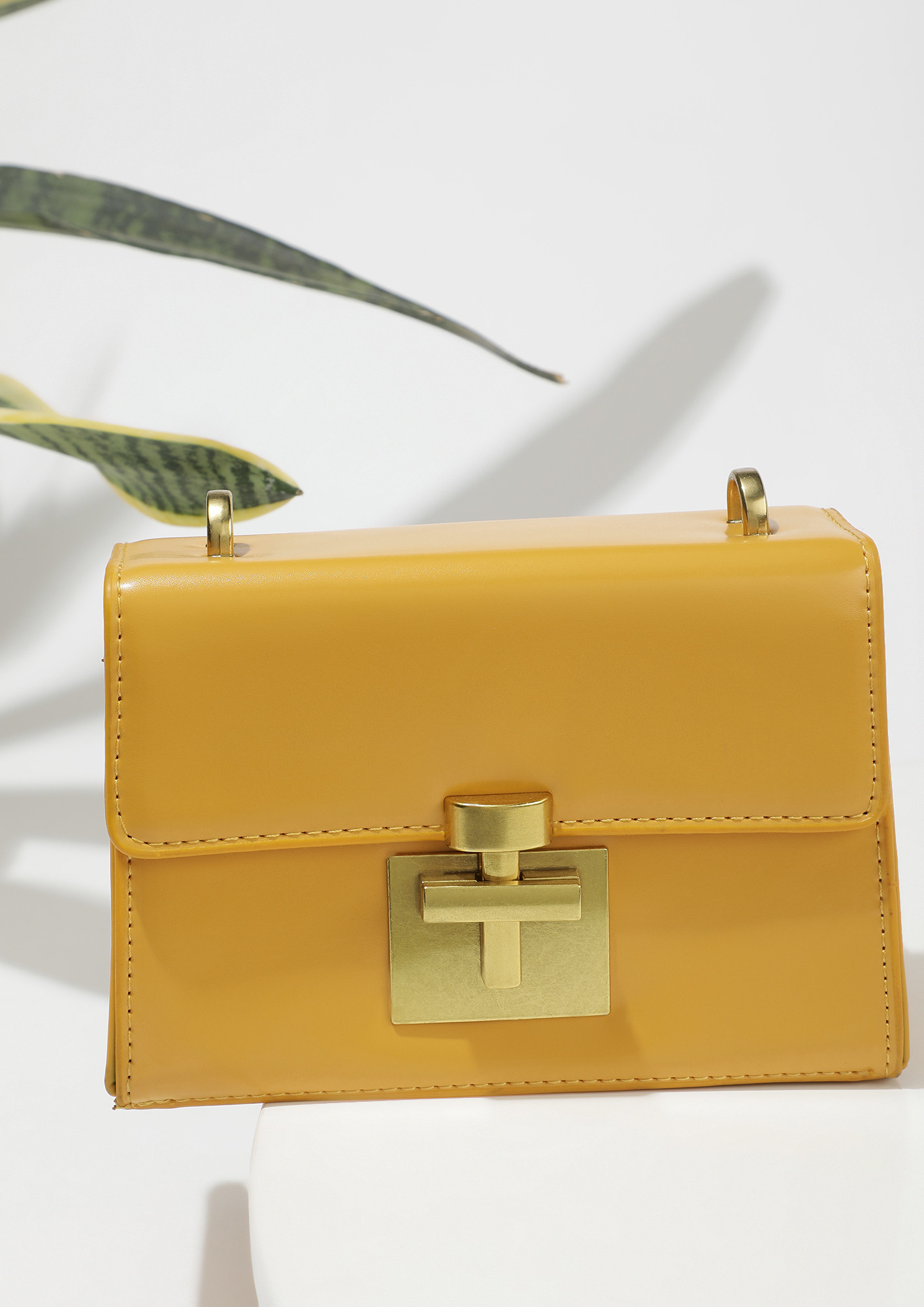 BLOCK IN STYLE YELLOW SLING BAG