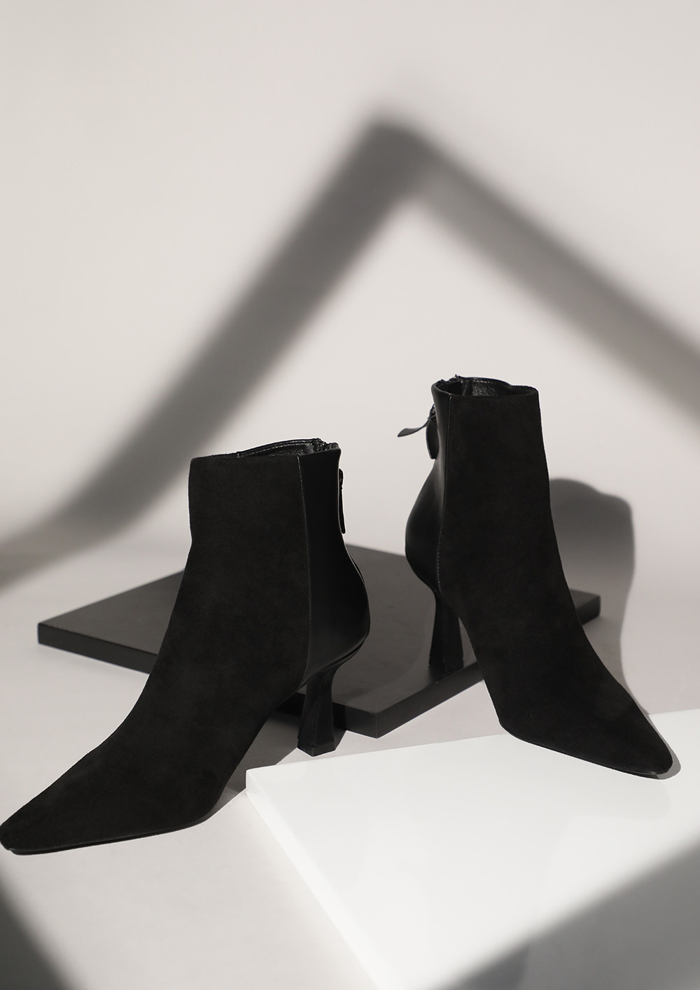 A DUAL APPROACH BLACK ANKLE BOOTS