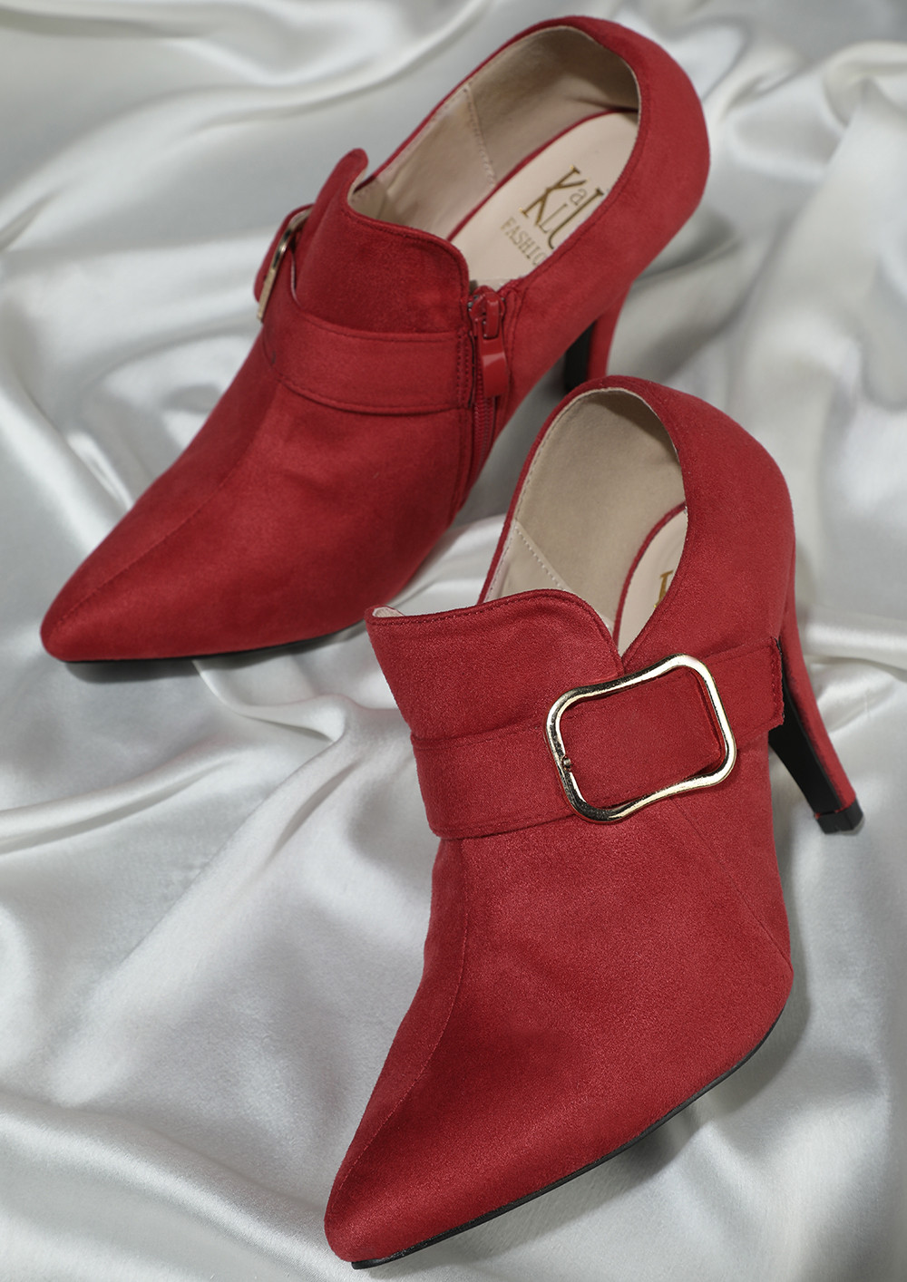 OFFICIALLY TEMPTING RED HEELED SHOES