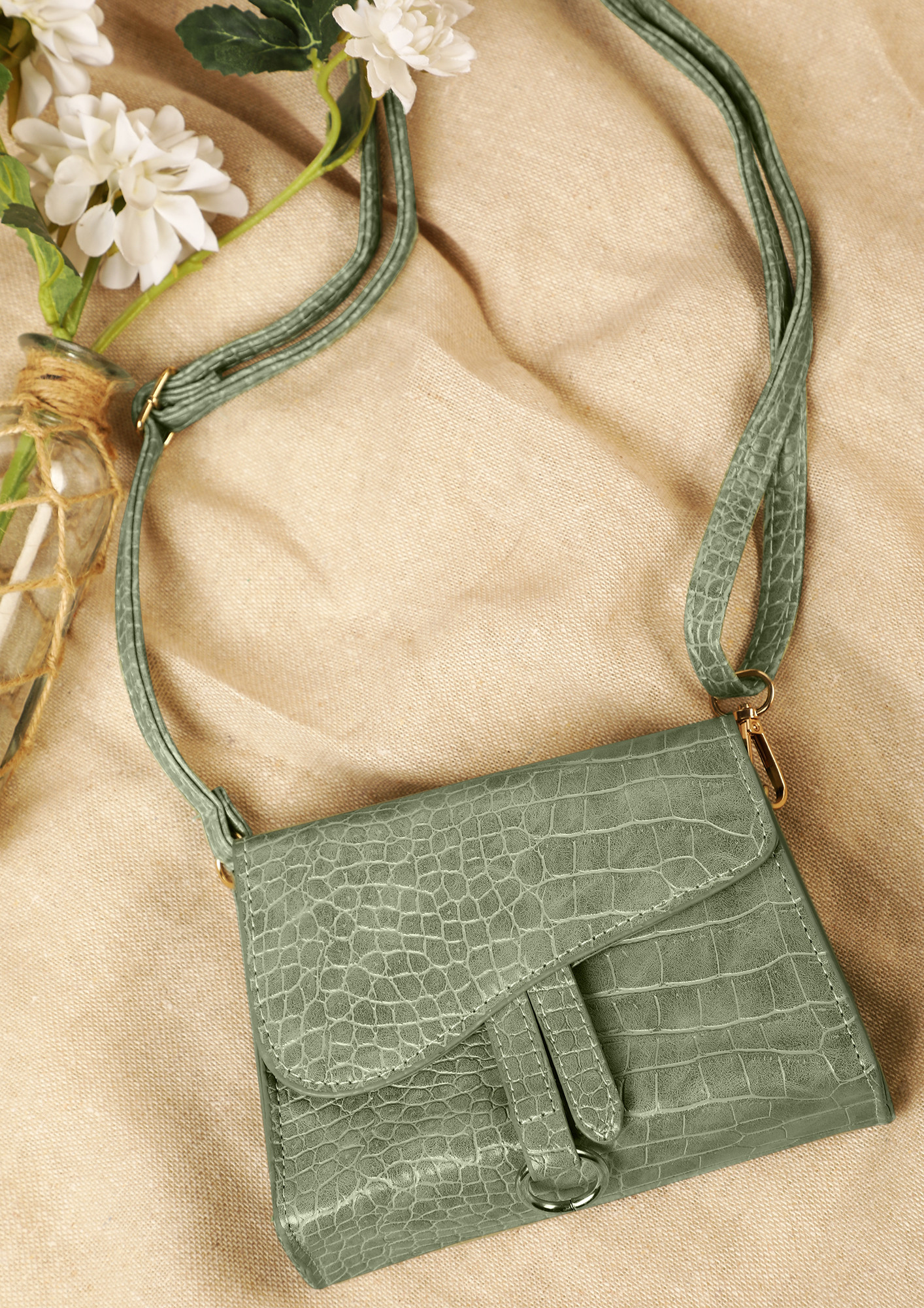 POSH AND SPICY GREEN SLING BAG