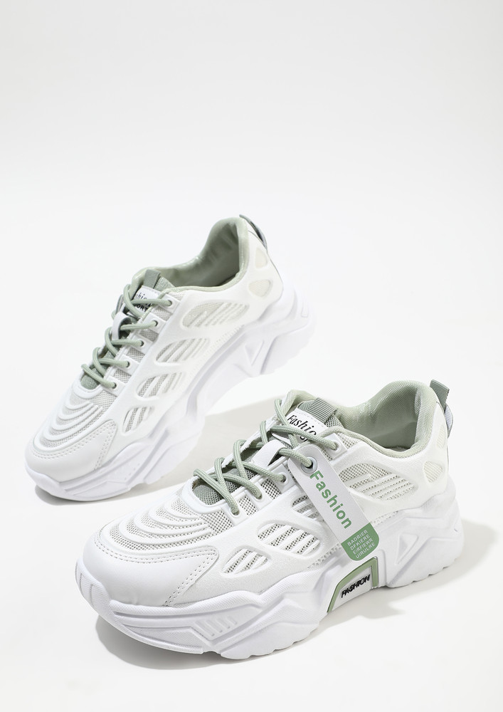 Fitness Mode On Green Trainers