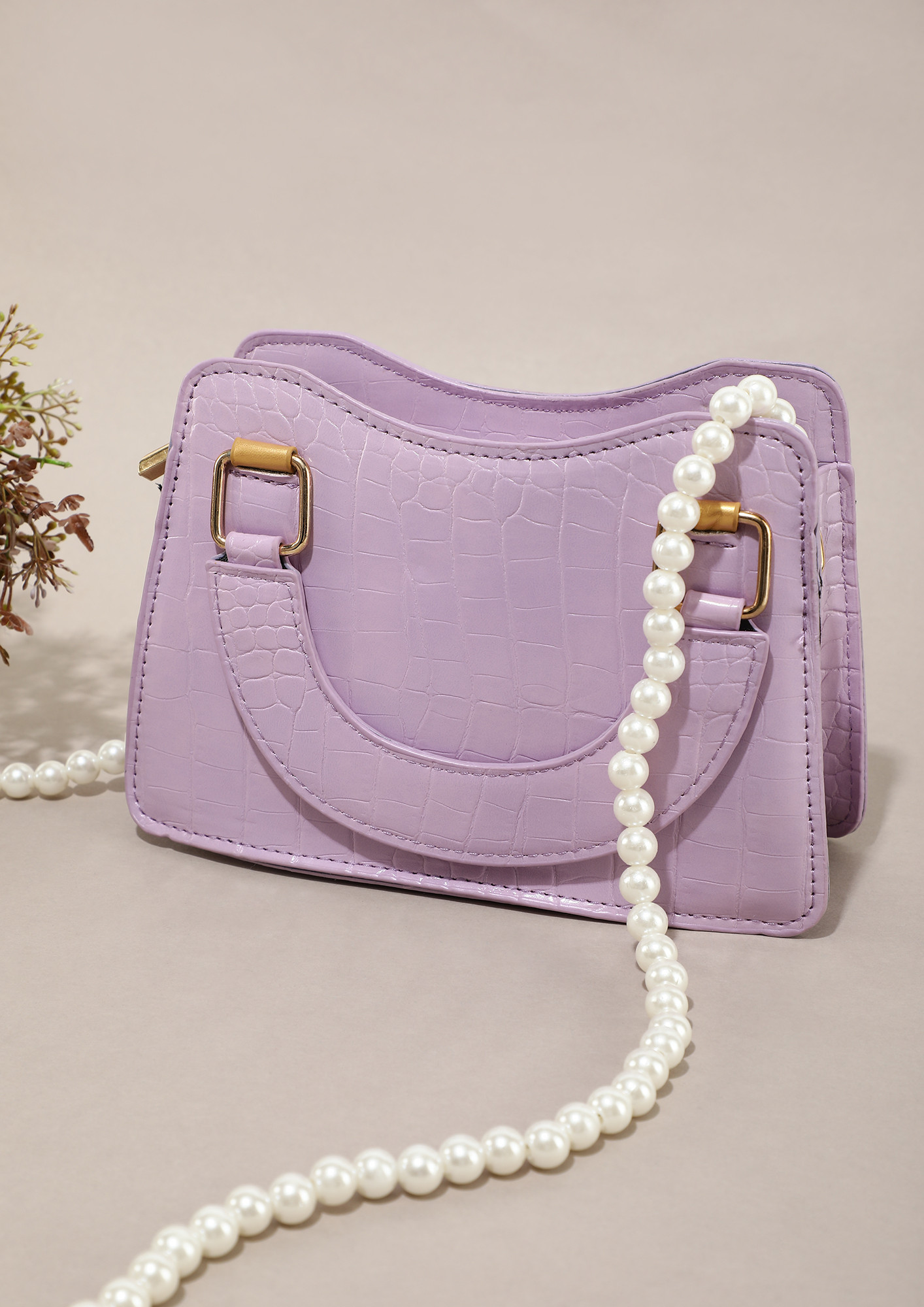 TINY BUT MIGHTY PURPLE SLING BAG