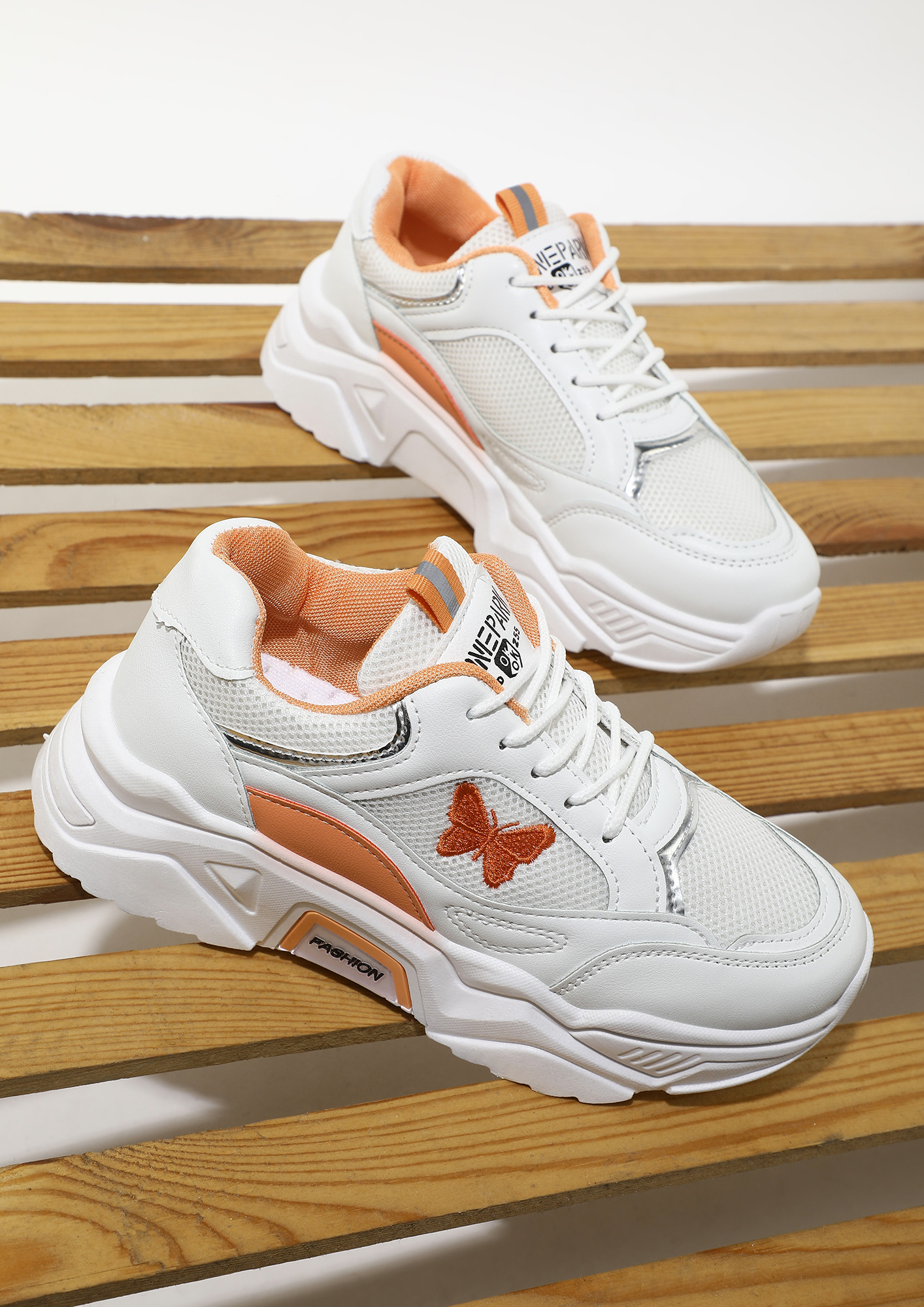 PICK UP THE PACE ORANGE TRAINERS