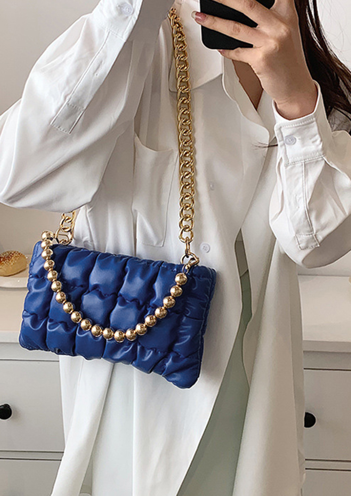 WHAT A QUILTED LEATHER BLUE HANDBAG