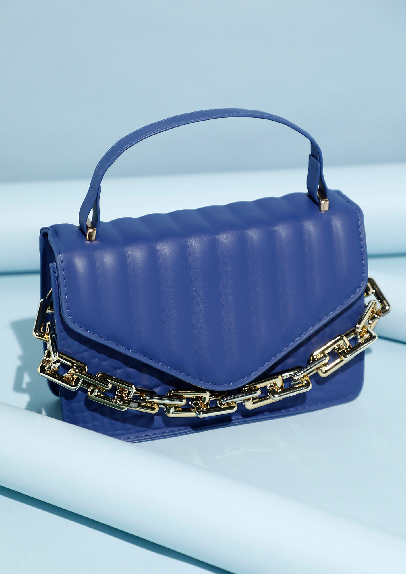 KNOWN FOR REAL BLUE QUILTED HANDBAG