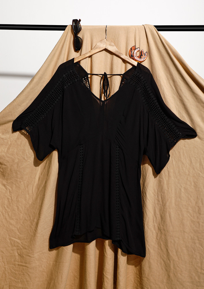 A Hollow-out Detail Solid Black Tunic Top