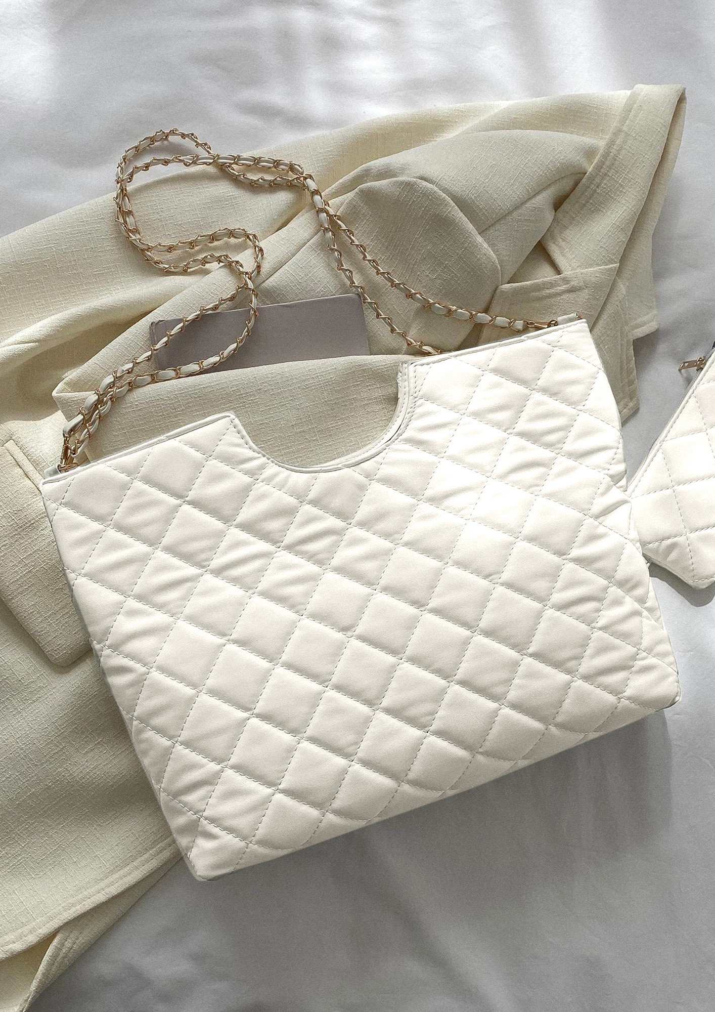 Buy C-CUT DETAIL WHITE QUILTED HANDBAG for Women Online in India