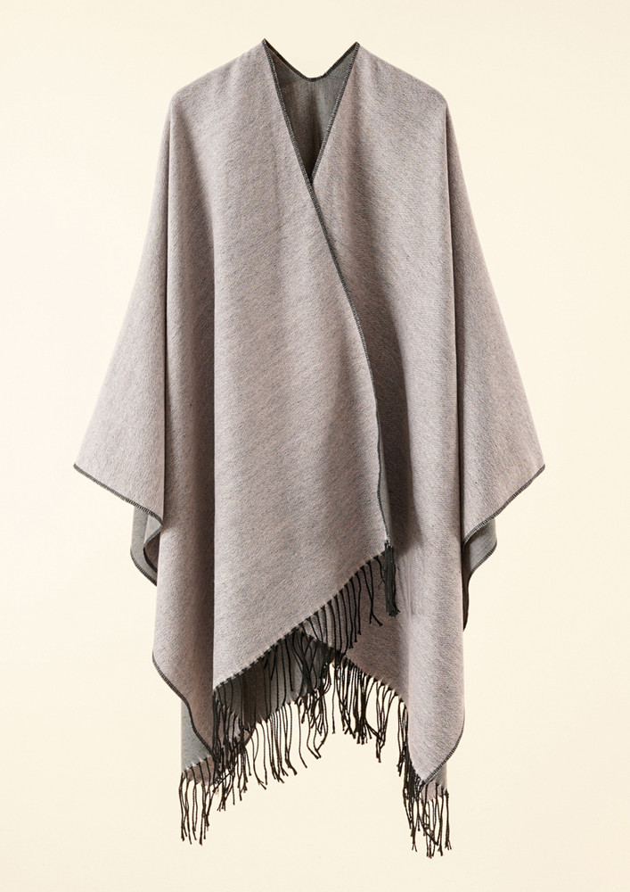 REVERSIBLLY YOURS IN A KNITTED, TASSEL DETAIL, BEIGE, SHAWL CAPE