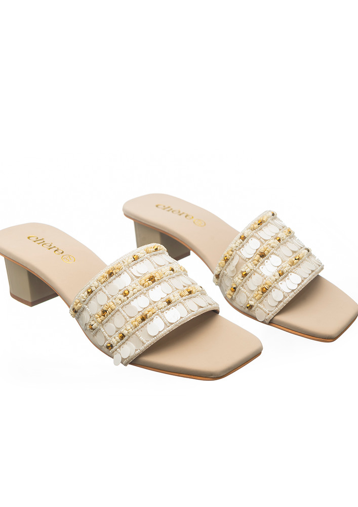 Cream textured slider heels