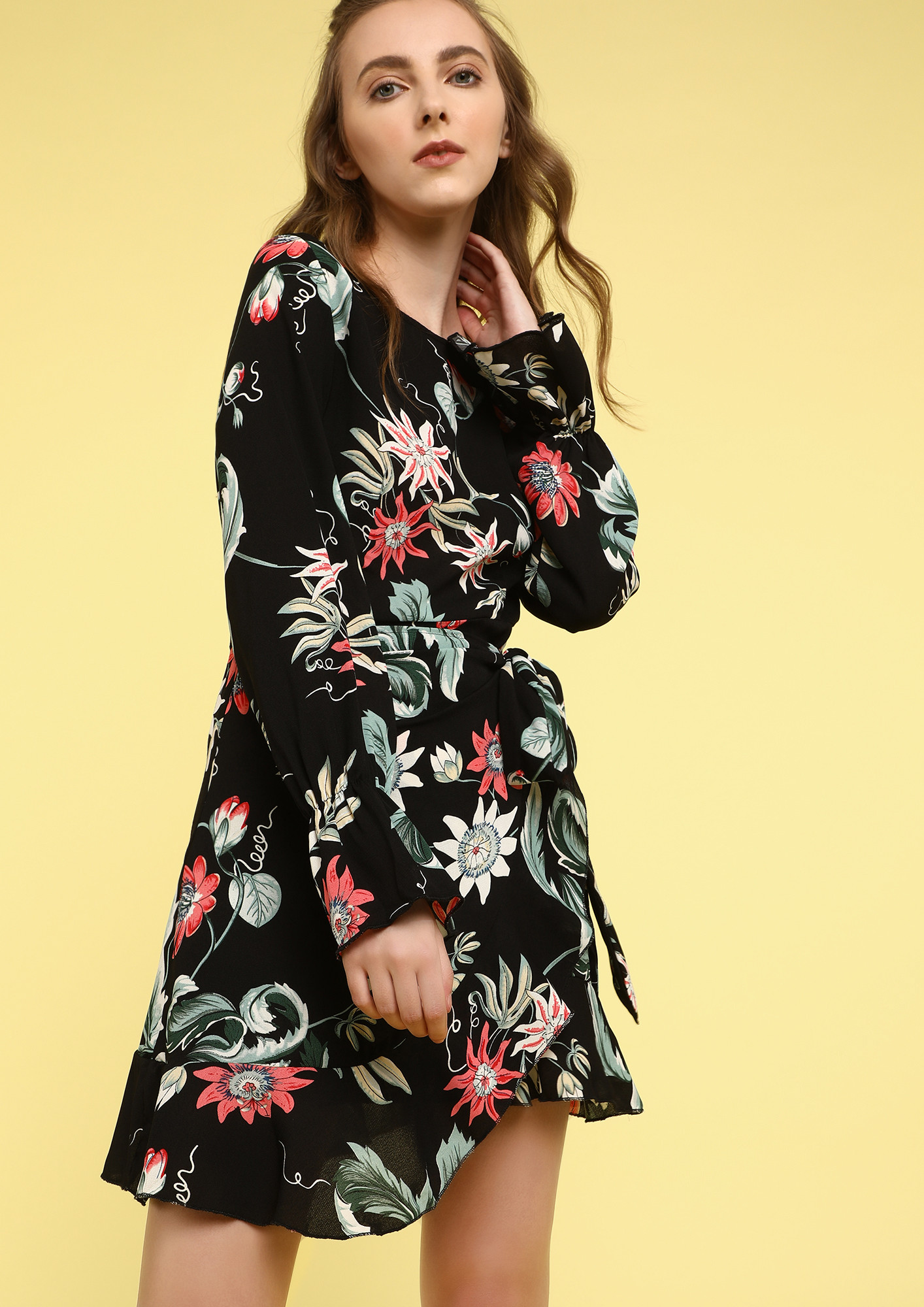 CARRYING ALL FLORA AND FAUNA BLACK WRAP DRESS