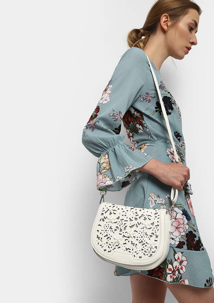 CUT-OUT WHITE SLING BAG