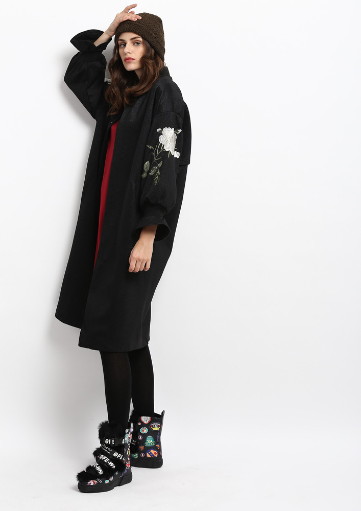 NOT YOUR BASIC BLACK TRENCH COAT