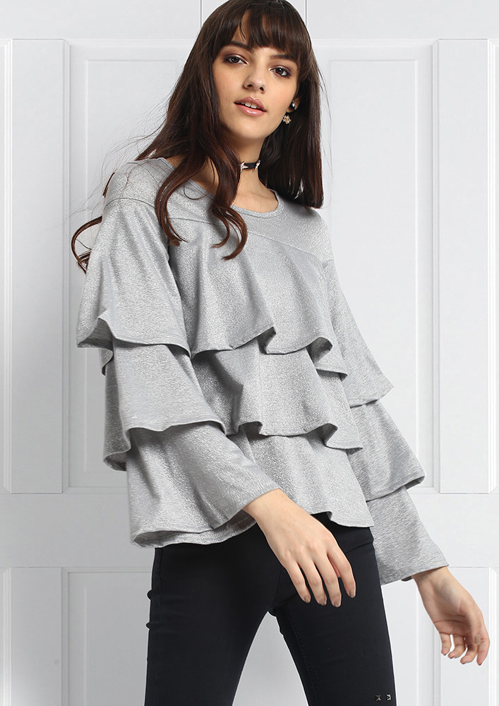 SHIMMER ME SILVER RUFFLE TOP